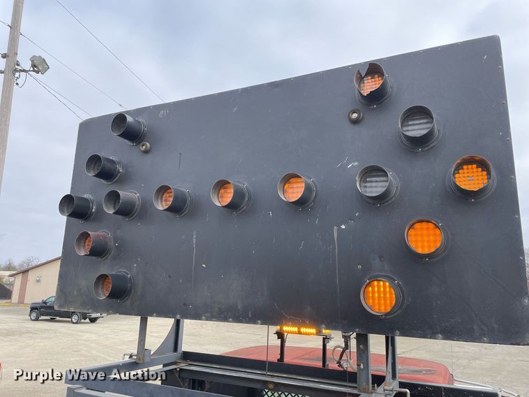 image for item DP0265 2000 International  4700 flatbed truck with crash attenuator