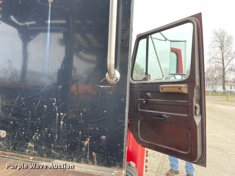 image for item DP0265 2000 International  4700 flatbed truck with crash attenuator