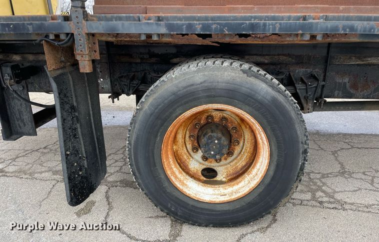 image for item DP0265 2000 International  4700 flatbed truck with crash attenuator