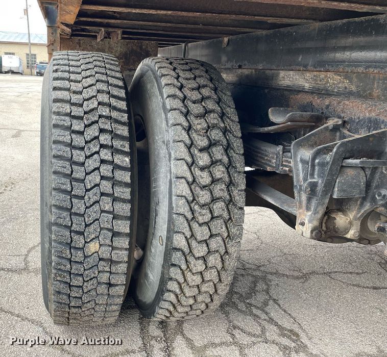 image for item DP0265 2000 International  4700 flatbed truck with crash attenuator