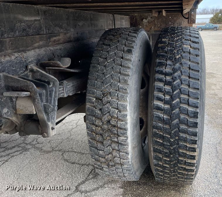 image for item DP0265 2000 International  4700 flatbed truck with crash attenuator