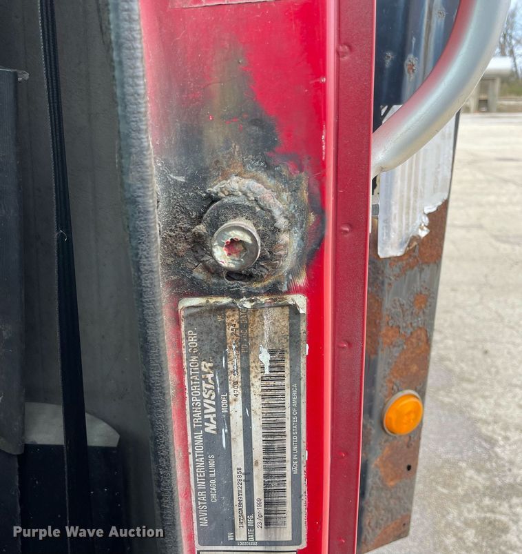 image for item DP0265 2000 International  4700 flatbed truck with crash attenuator