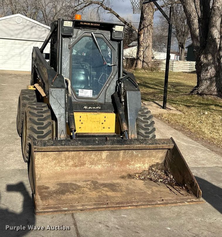 image for item DQ7406 1998 New Holland LX885  skid steer loader