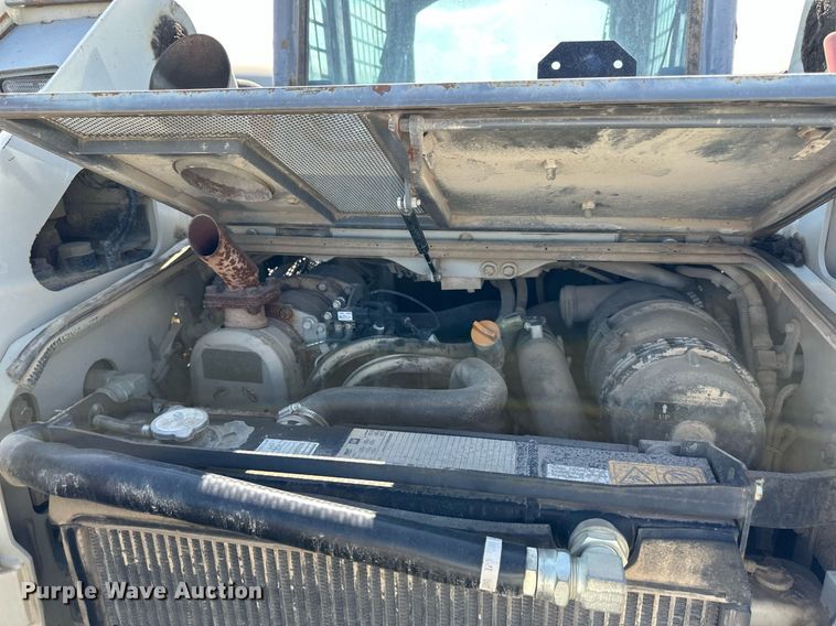 image for item NL9323 2015 Takeuchi  TL10 tracked skid steer loader