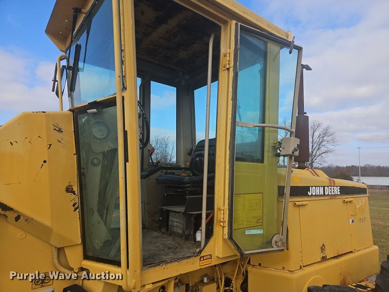 image for item NZ9097 1994 John Deere 570B  motor grader