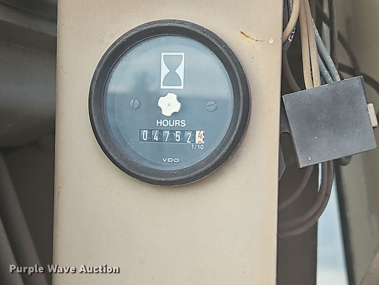 image for item NZ9097 1994 John Deere 570B  motor grader