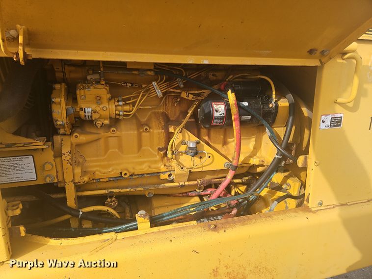 image for item NZ9097 1994 John Deere 570B  motor grader