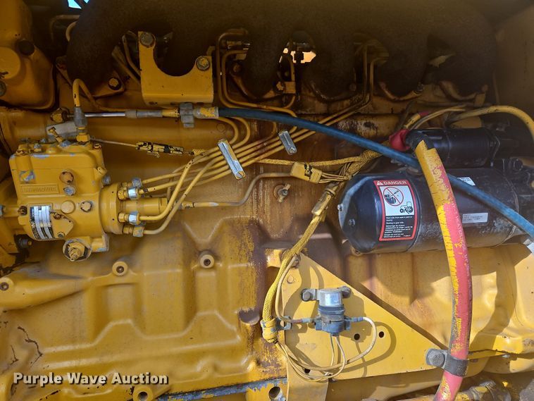 image for item NZ9097 1994 John Deere 570B  motor grader