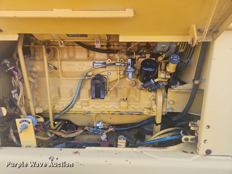 image for item NZ9097 1994 John Deere 570B  motor grader