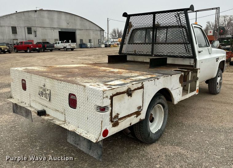 image for item IB9311 1985 GMC Sierra 3500  flatbed pickup truck