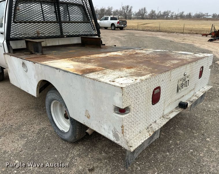 image for item IB9311 1985 GMC Sierra 3500  flatbed pickup truck