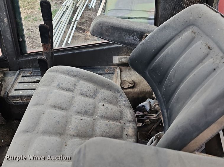 image for item NE9343 1982 Hesston 6450  swather / windrower