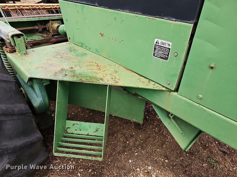 image for item NE9344 1981 John Deere 2280  swather / windrower