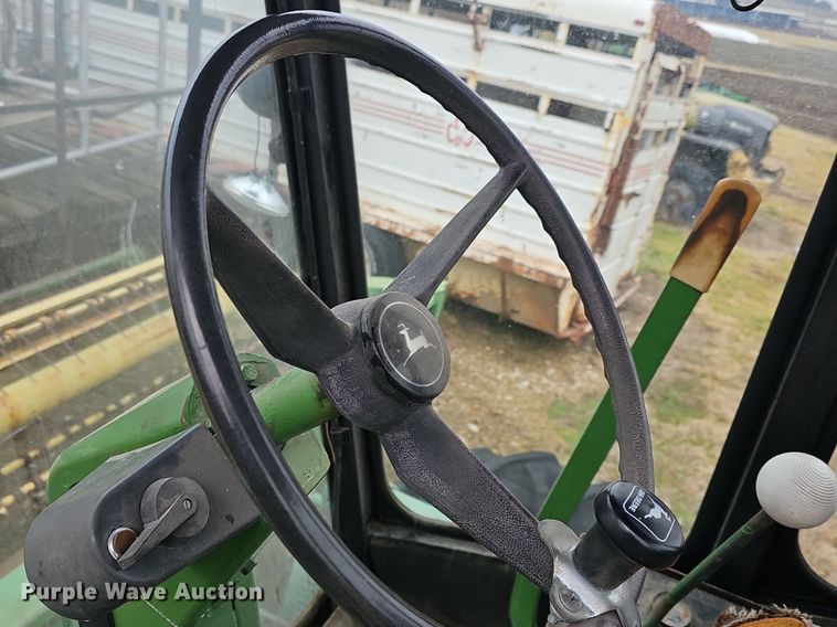 image for item NE9344 1981 John Deere 2280  swather / windrower