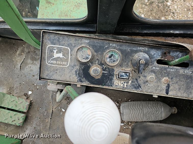 image for item NE9344 1981 John Deere 2280  swather / windrower