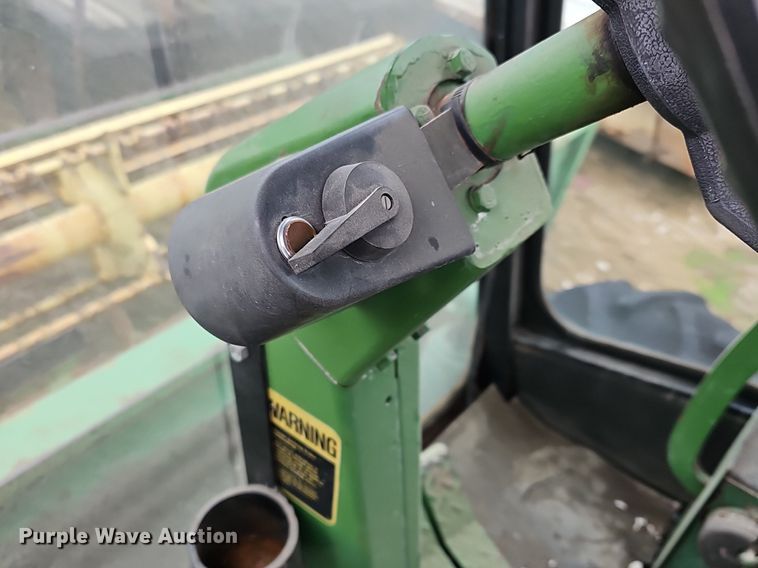 image for item NE9344 1981 John Deere 2280  swather / windrower