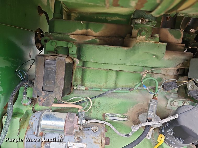 image for item NE9344 1981 John Deere 2280  swather / windrower