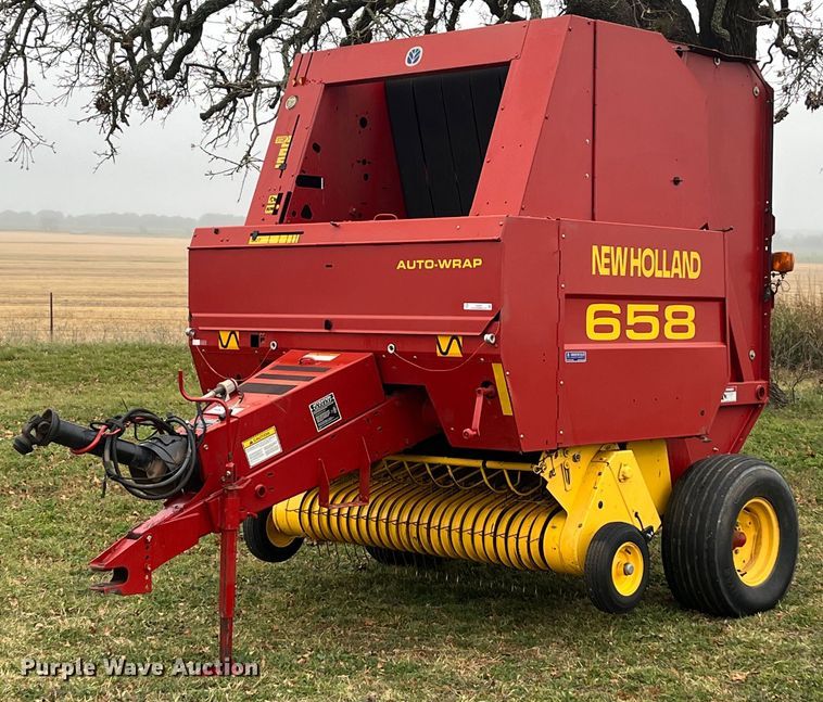 image for item EI0559 2001 New Holland 658  round baler
