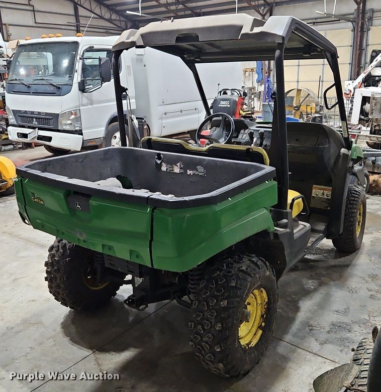 image for item LB9704 2013 John Deere Gator  utility bed pickup truck