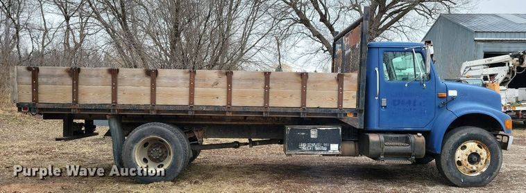 image for item LC9512 2000 International 4700  dump flatbed truck