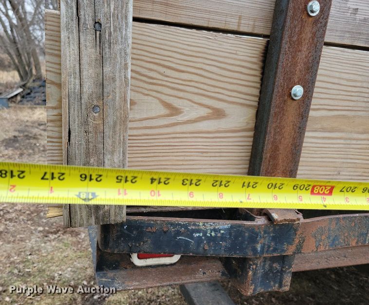 image for item LC9512 2000 International 4700  dump flatbed truck