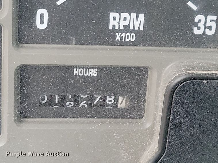 image for item LC9512 2000 International 4700  dump flatbed truck