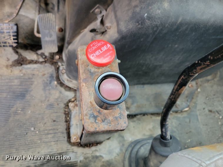 image for item LC9512 2000 International 4700  dump flatbed truck