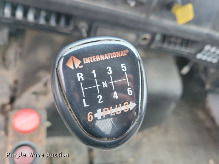 image for item LC9512 2000 International 4700  dump flatbed truck