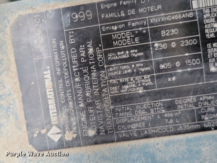 image for item LC9512 2000 International 4700  dump flatbed truck