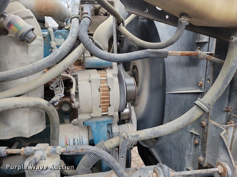 image for item LC9512 2000 International 4700  dump flatbed truck