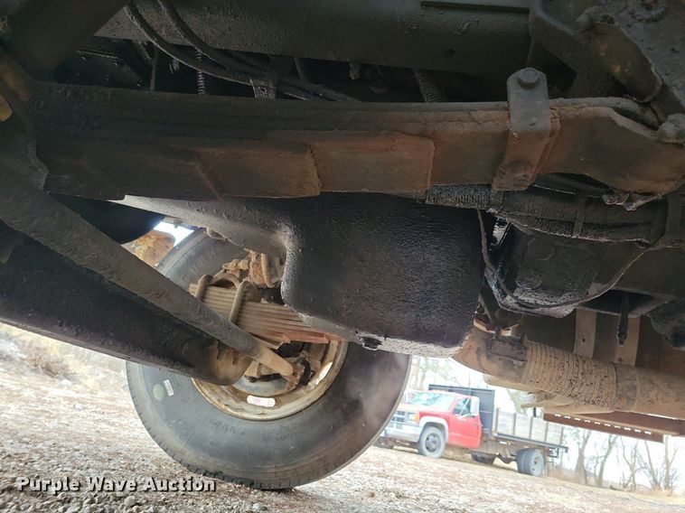 image for item LC9512 2000 International 4700  dump flatbed truck