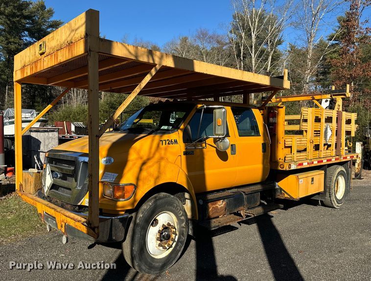 image for item NN9358 2011 Ford F750 Super Duty Crew Cab flatbed truck