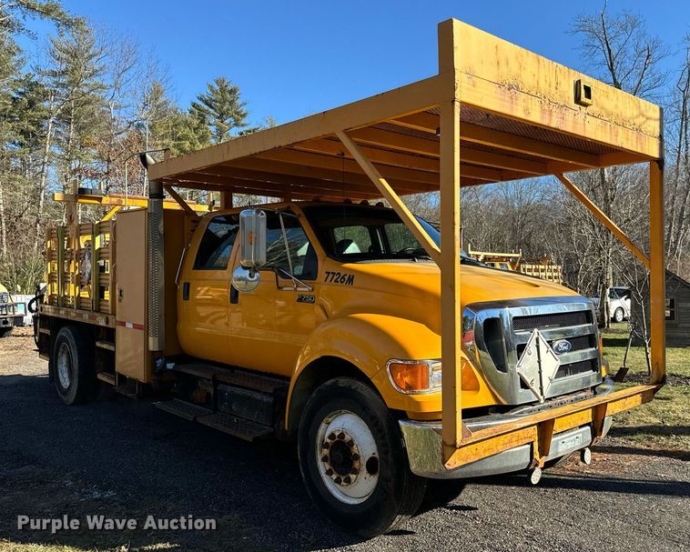 image for item NN9358 2011 Ford F750 Super Duty Crew Cab flatbed truck