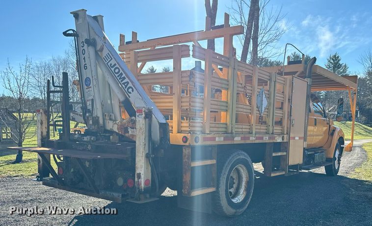 image for item NN9358 2011 Ford F750 Super Duty Crew Cab flatbed truck