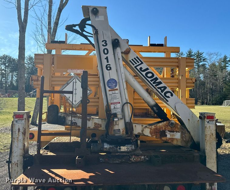 image for item NN9358 2011 Ford F750 Super Duty Crew Cab flatbed truck