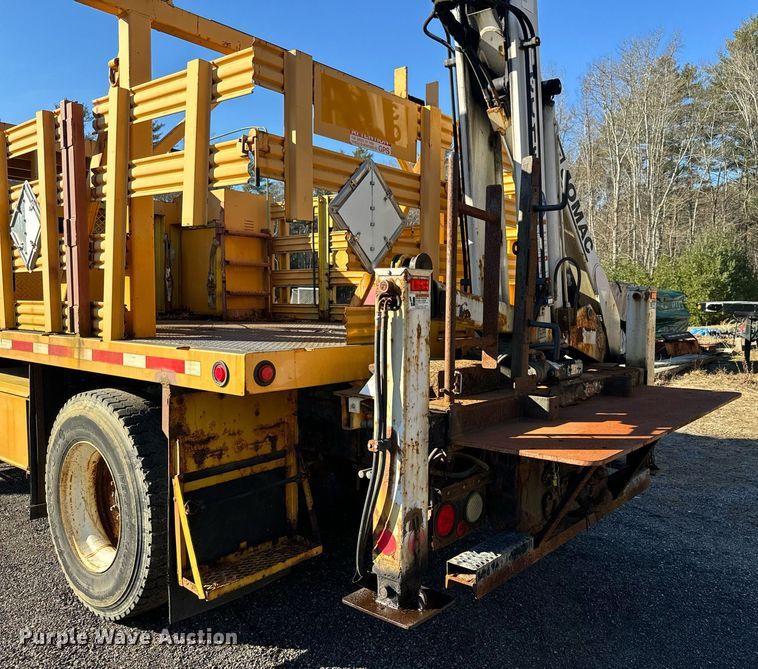 image for item NN9358 2011 Ford F750 Super Duty Crew Cab flatbed truck