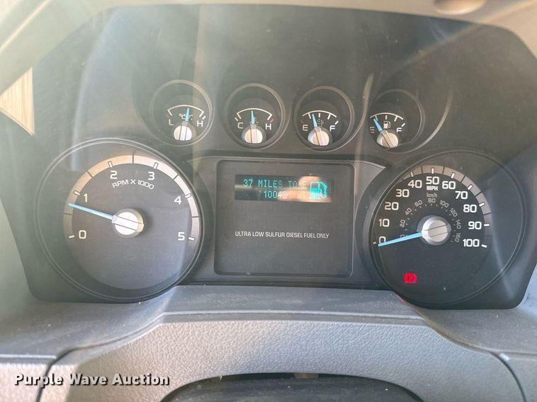 image for item NN9358 2011 Ford F750 Super Duty Crew Cab flatbed truck