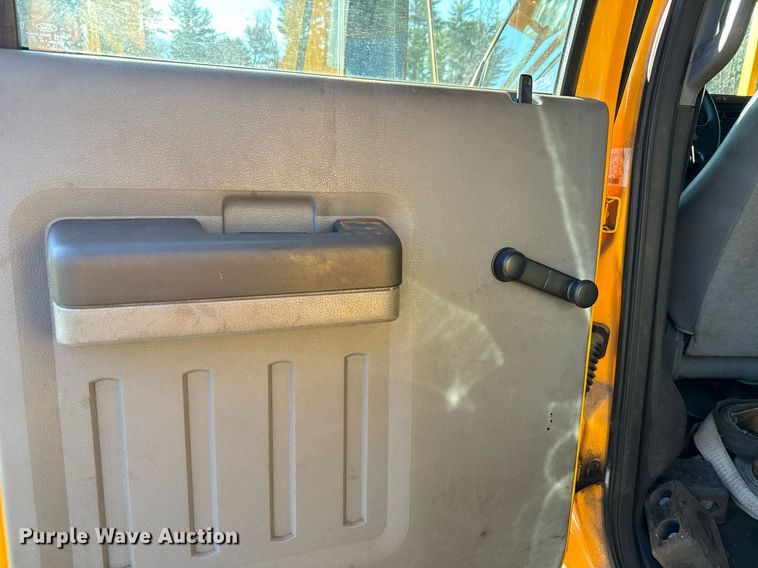 image for item NN9358 2011 Ford F750 Super Duty Crew Cab flatbed truck