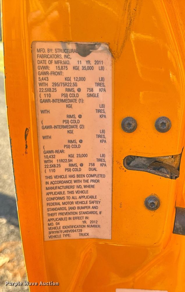 image for item NN9358 2011 Ford F750 Super Duty Crew Cab flatbed truck