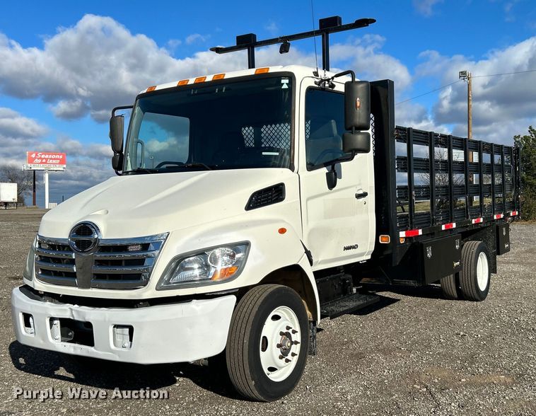image for item OI9503 2010 Hino 185 flatbed truck