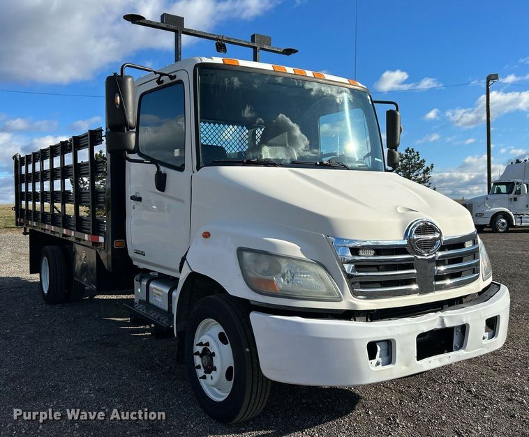 image for item OI9503 2010 Hino 185 flatbed truck