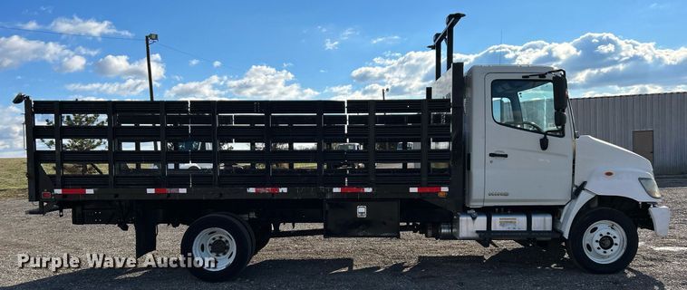 image for item OI9503 2010 Hino 185 flatbed truck