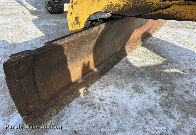 image for item DQ1081 1990 John Deere 770 motor grader