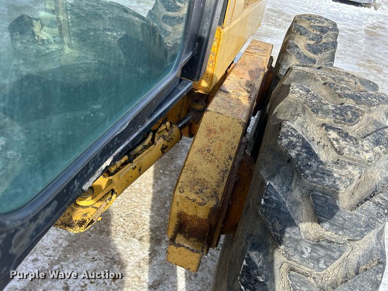 image for item DQ1081 1990 John Deere 770 motor grader