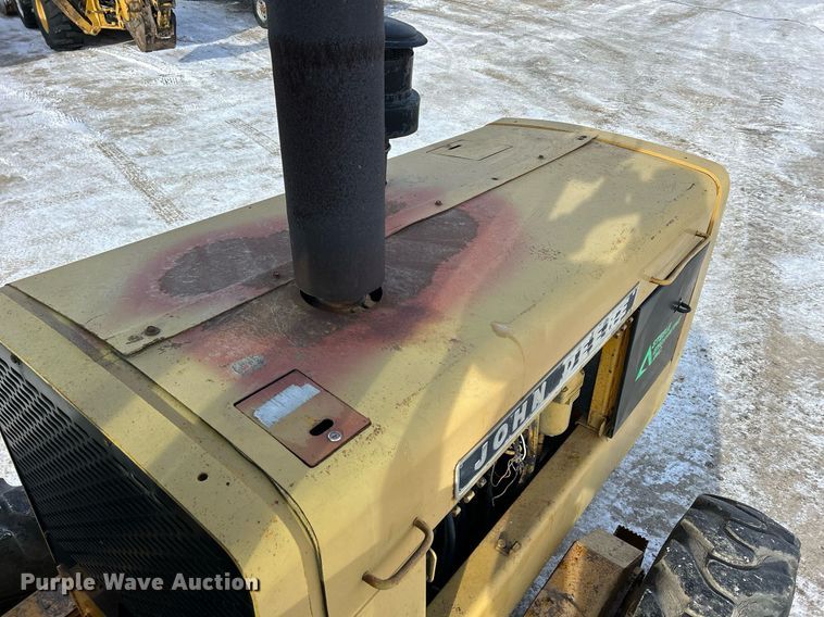 image for item DQ1081 1990 John Deere 770 motor grader