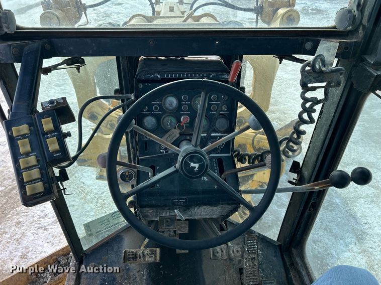 image for item DQ1081 1990 John Deere 770 motor grader