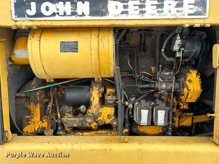 image for item DQ1081 1990 John Deere 770 motor grader