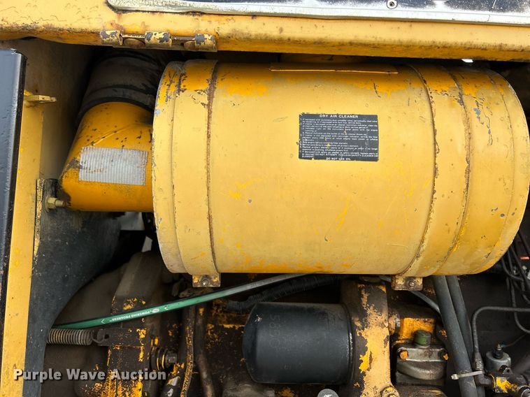 image for item DQ1081 1990 John Deere 770 motor grader