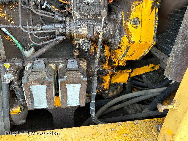 image for item DQ1081 1990 John Deere 770 motor grader