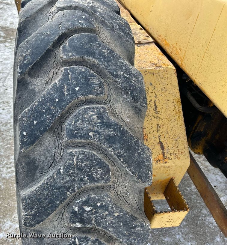 image for item DQ1081 1990 John Deere 770 motor grader